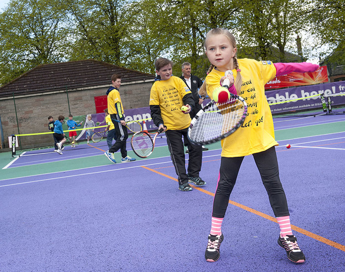 Girl playing Tennis